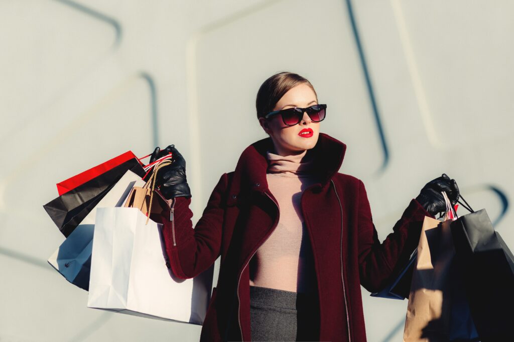 consumeristic woman with shopping bags