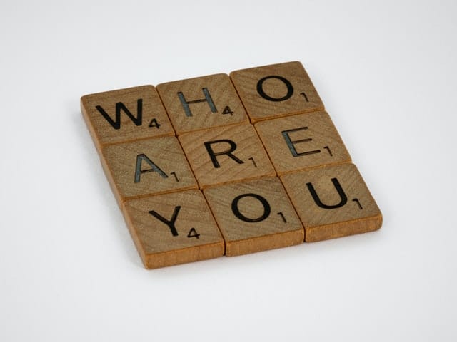 scrabble tiles illustrating identidy confusion of suddenly wealthy
