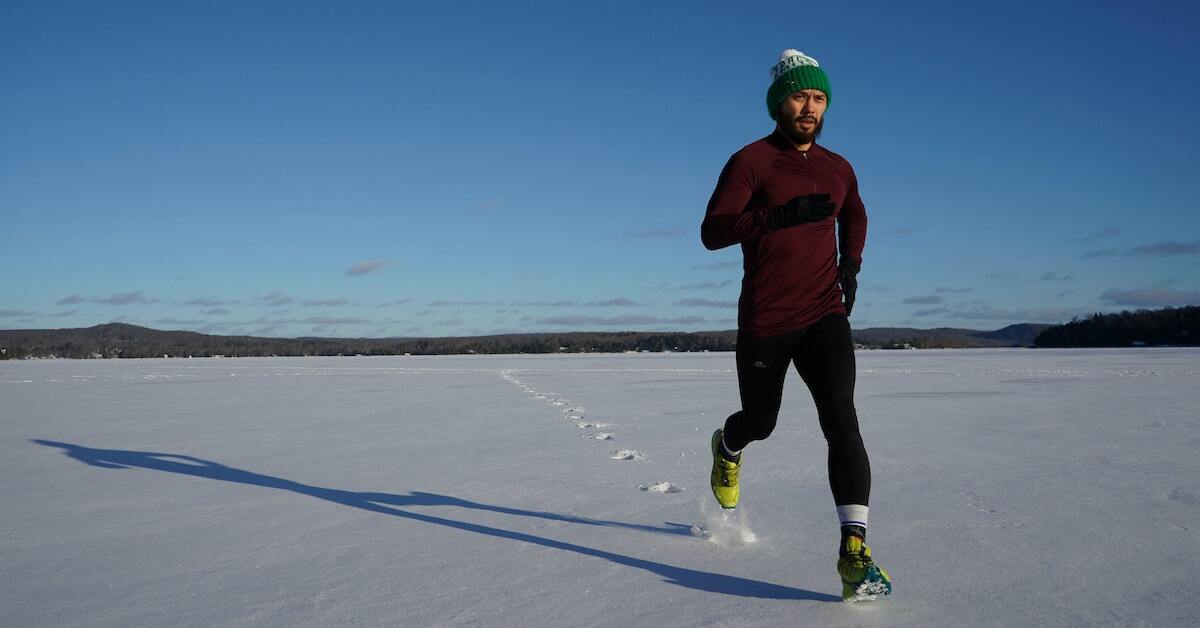 man running aross frozen lake doing something to escape anxiety about what others think